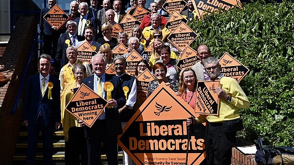 Lib Dems with diamonds on the steps of Lodden Valley leisure centre in the sunshine