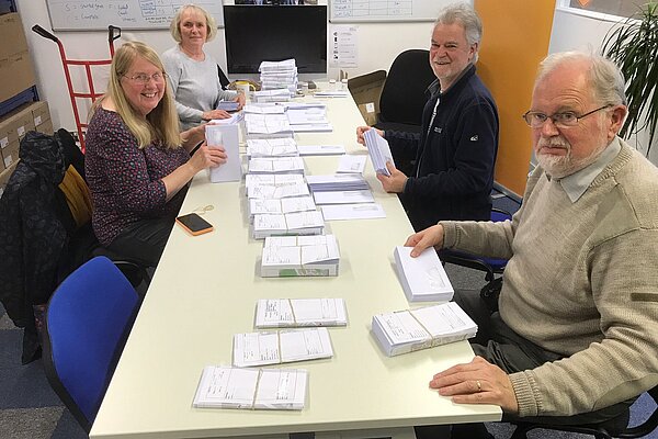 Lib dems stuffing envelopes in our office