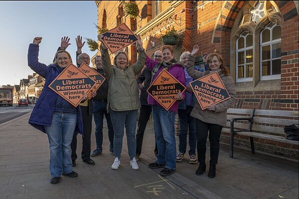 Lib Dems cheering outside Wokingham Town hall