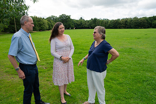 Prue and Paul talking with a resident