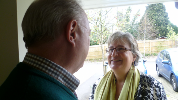 Lib Dem councillor Prue Bray chatting to resident on their doorstep