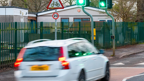 Photo showing a car travelling in a 20mph zone