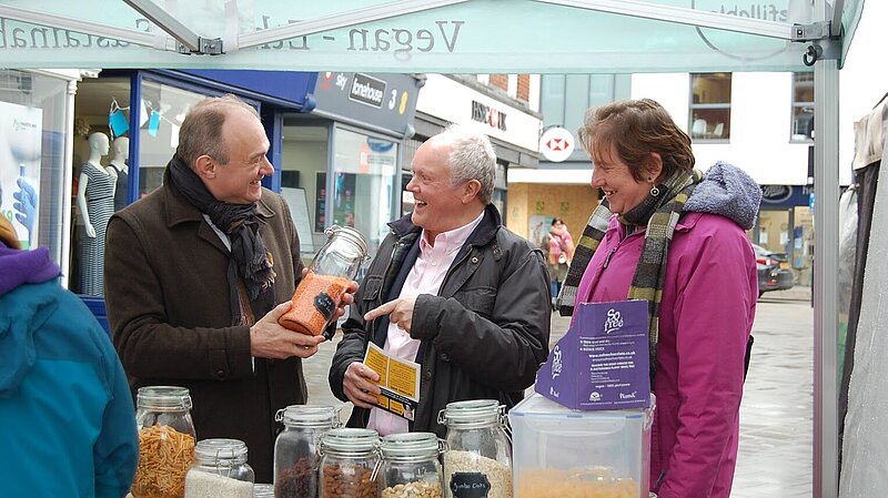 Ed Davey, Clive Jones and WBC Councilors shopping in Wokingham market